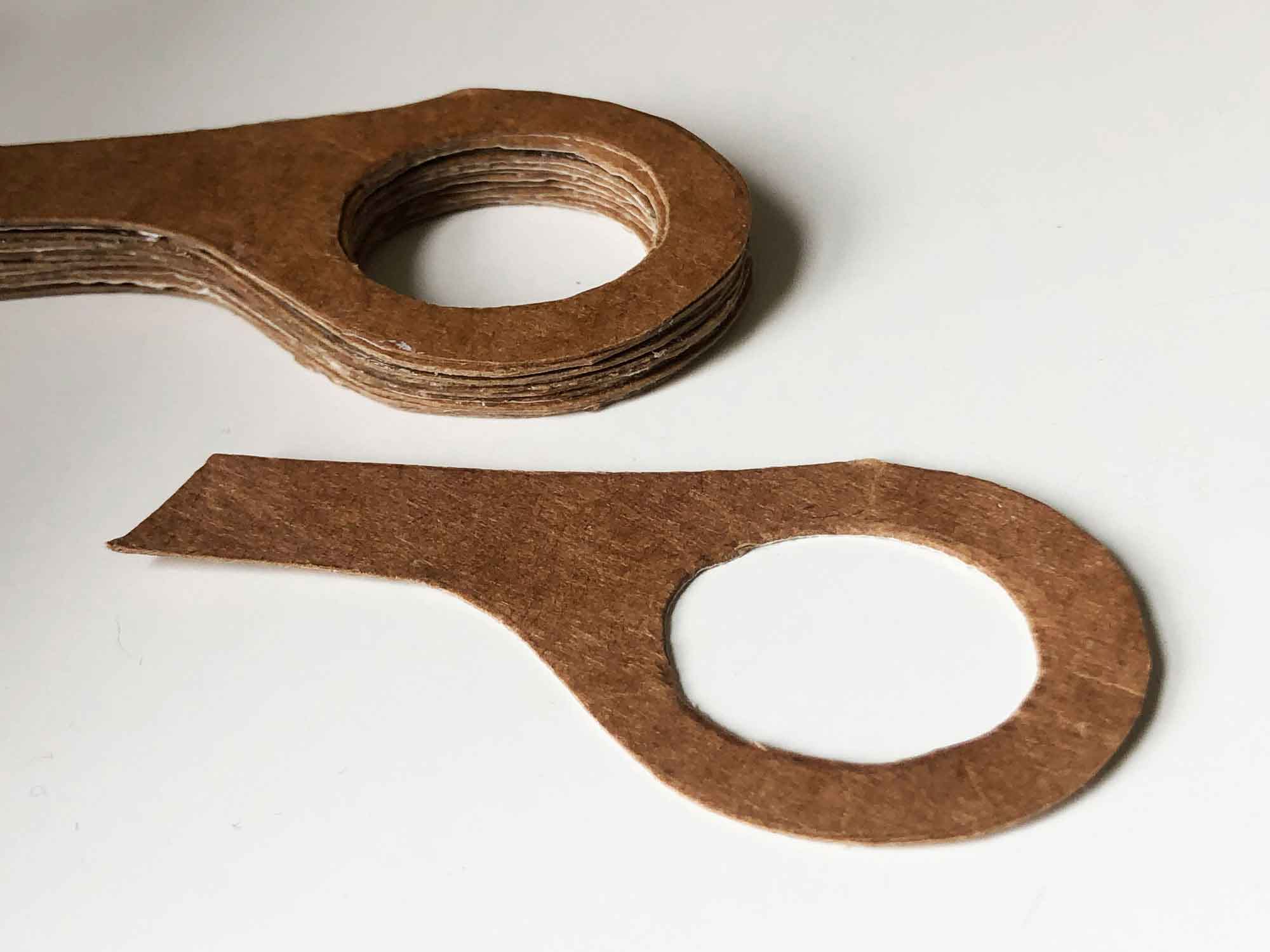 photograph of carboard layers of the scissors handle
